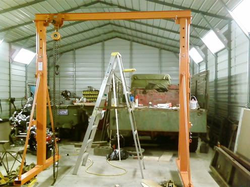 Assembled and cranked up.  This is about 10ft high.  Still have another 2 ft-ish left.  Nice solid crane for a total cost of less than $600.