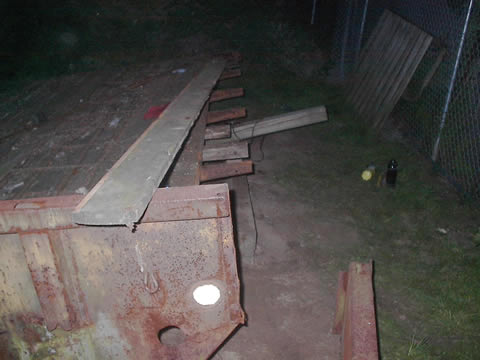 Here's a shot of the floor planks (still OD) and the sills that the side panel bolts to.