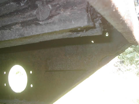 You can barely see the steel tube that was welded on but previous owners.  This weld was right at the bolts and the flange for the side/rear.. so taking it off was a must before anything else came off... beware of hidden dangers... it took me a while to f